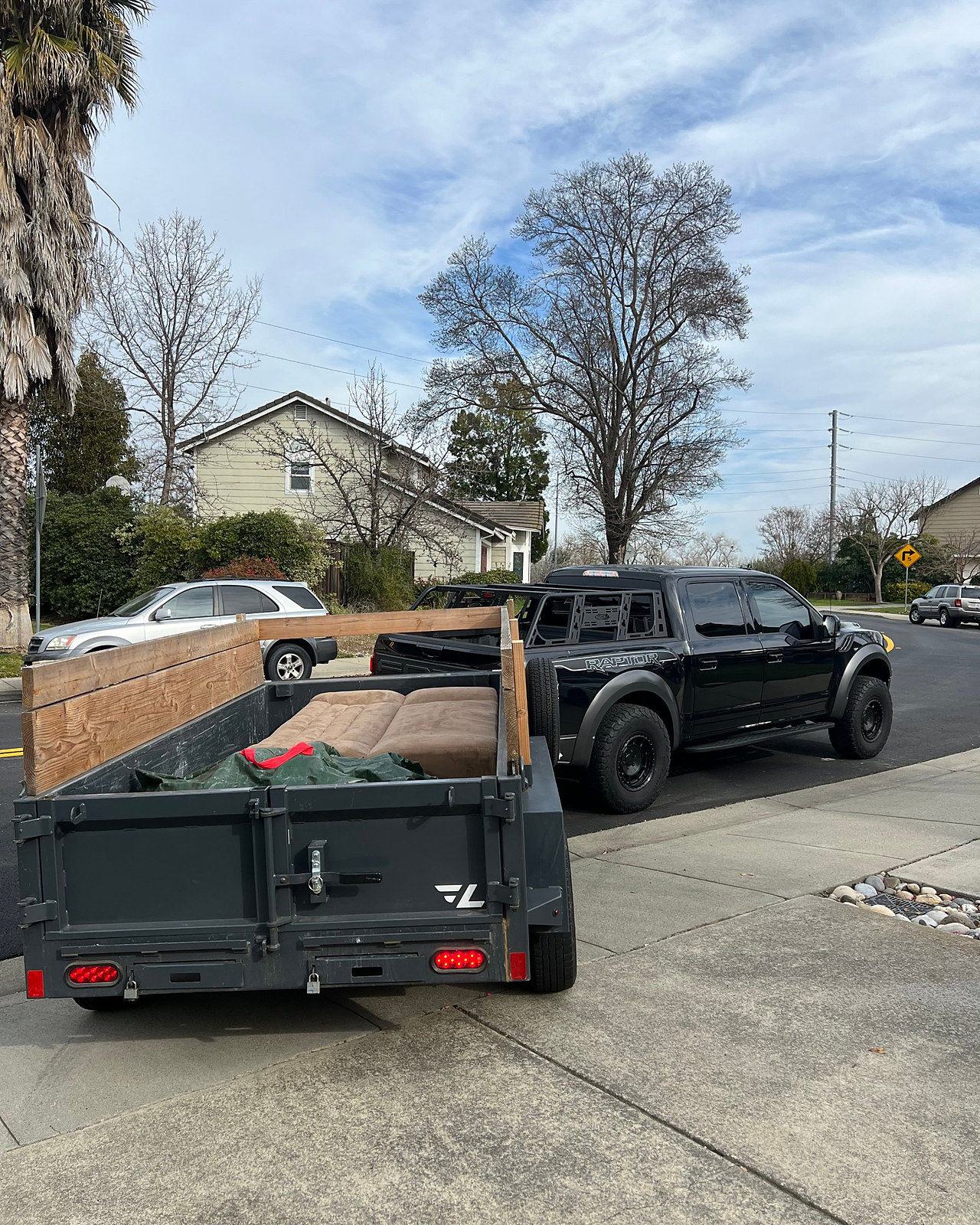 Couch and debris, loaded and hauled by Louis's Exterior Services
