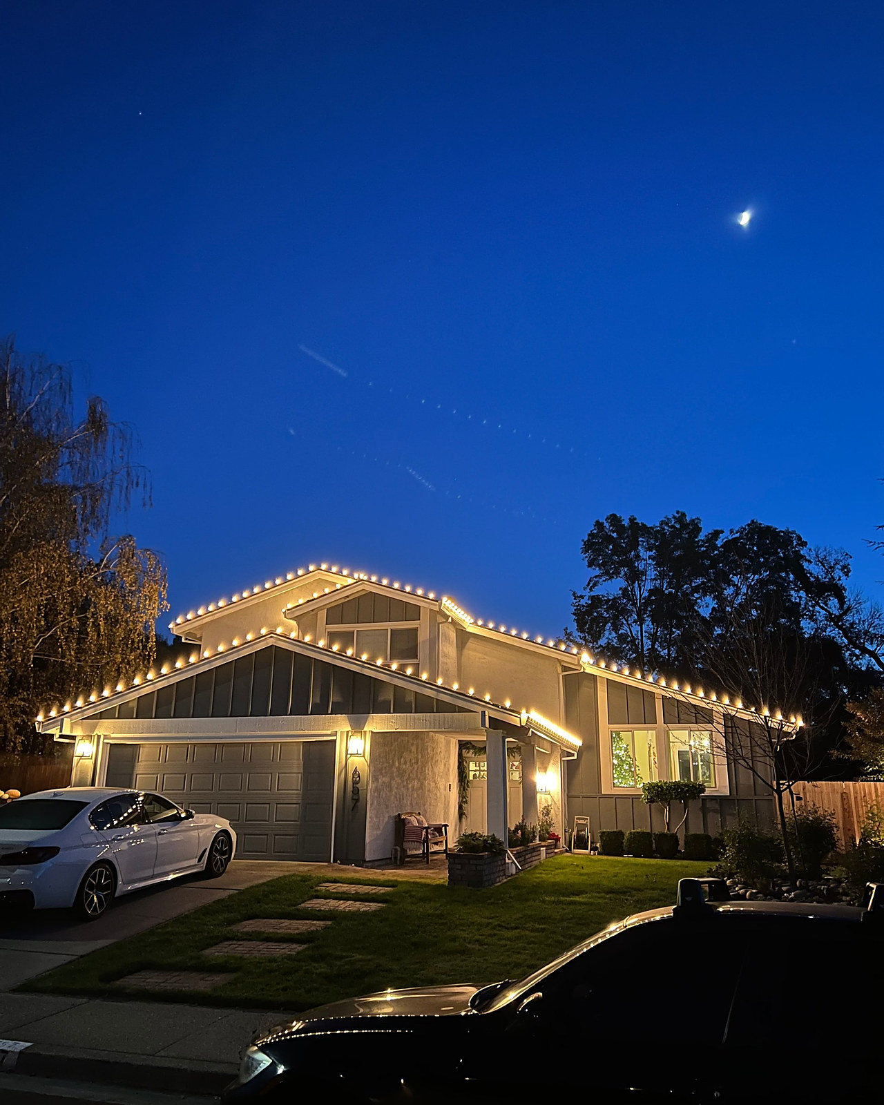 Two-story roofline, warm white by Louis's Exterior Services